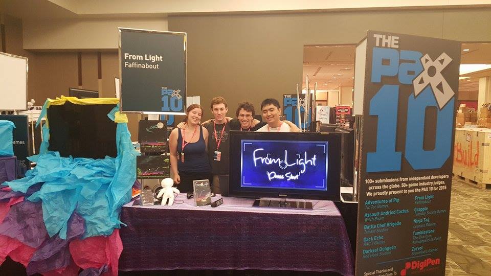 Photo of us at the booth.